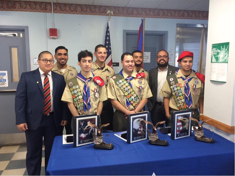 Juan Osorio congratulates Eagle Scouts.